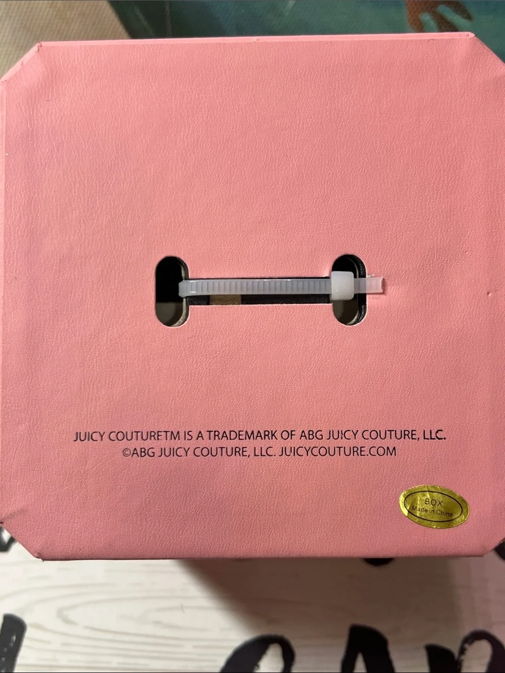 Juicy Couture gold tone